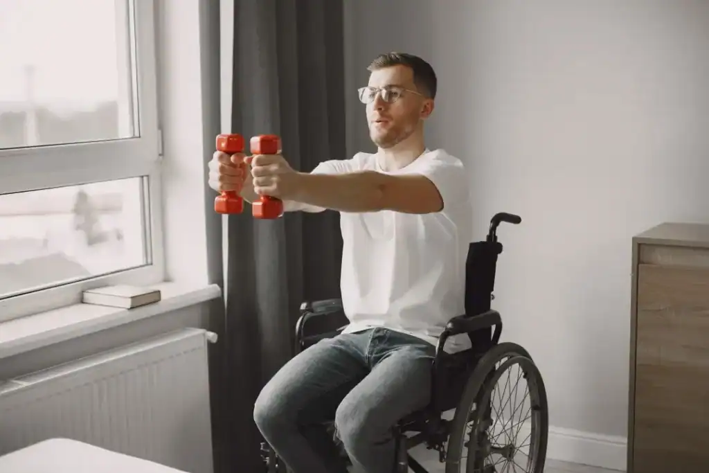 Image of man doing exercise in his wheelchair to aid weight loss Lowestoft
